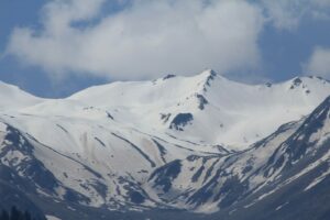 snow covered mountain under blue sky during daytime