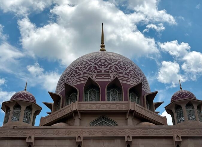 A large building with a clock on the top of it